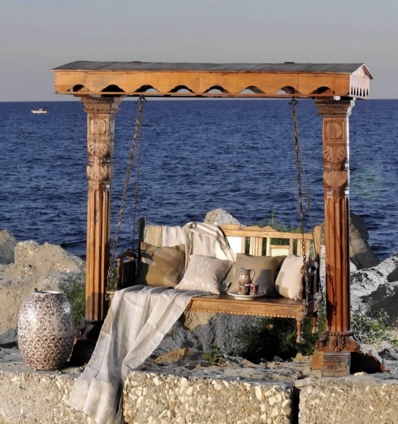 Indian sculpted swing chair